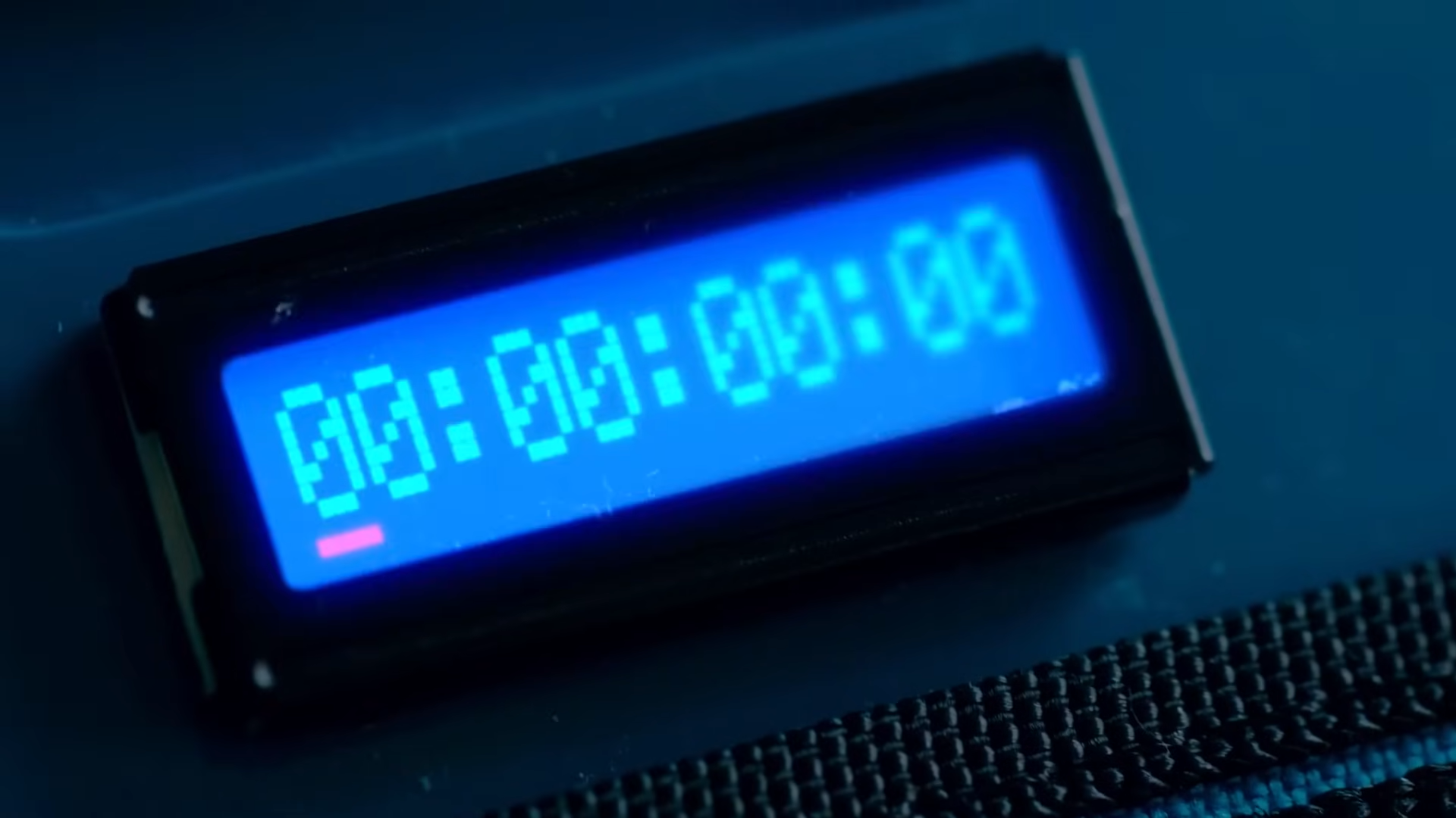 The backpack's screen showing a timer displaying all zeroes.